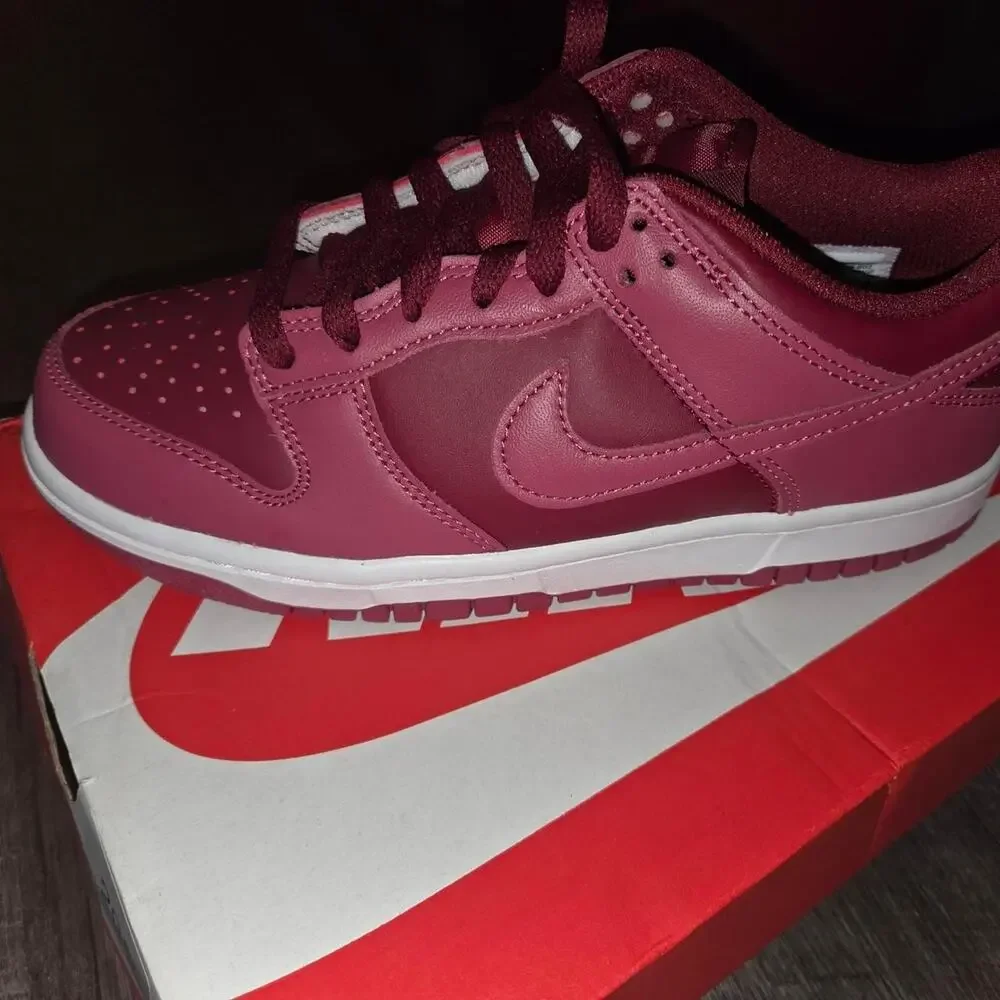 Nike pink low top trainers